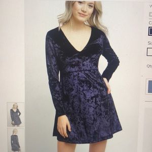 Never worn Adorable Navy long sleeved velvet dress